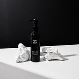 ZOUSZ Black Oud Beard Shampoo bottle close-up — luxury oud beard wash UK