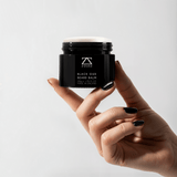 Man holding the ZOUSZ Black Oud Beard Balm — small-batch British men's grooming